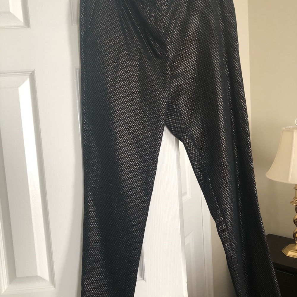 Black and gold skinny pants.